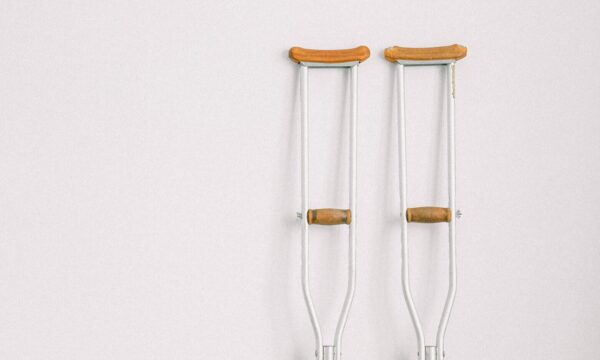 Crutches leaning against a wall