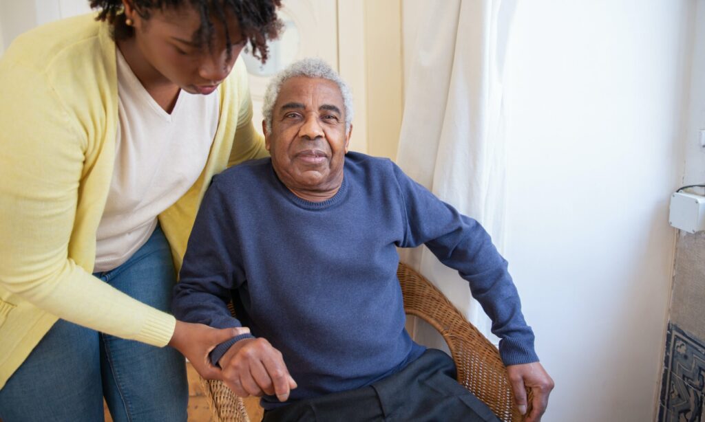 A man with his carer