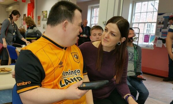 Martin with his carer using Hear Me Now